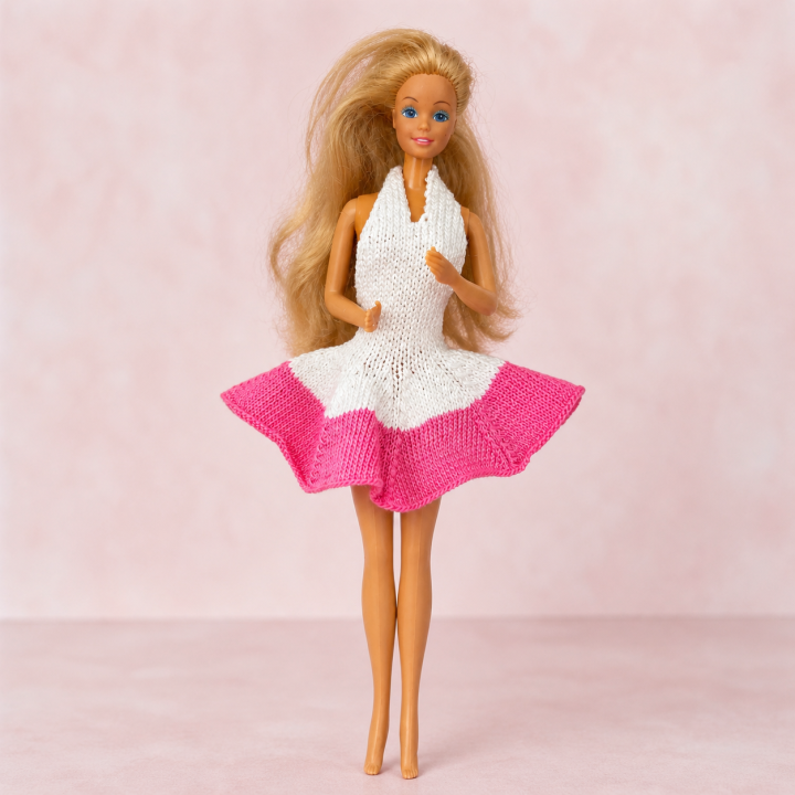 Robe rose et blanche pour poupée Barbie™